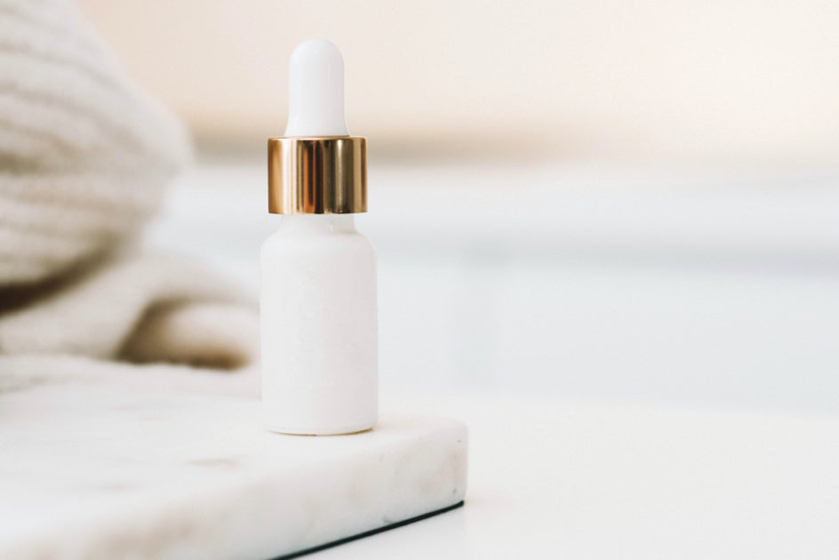 Skincare bottle on marble desk