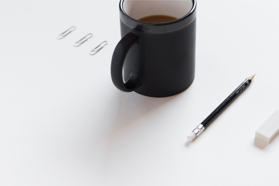 Mug and pencil on desk