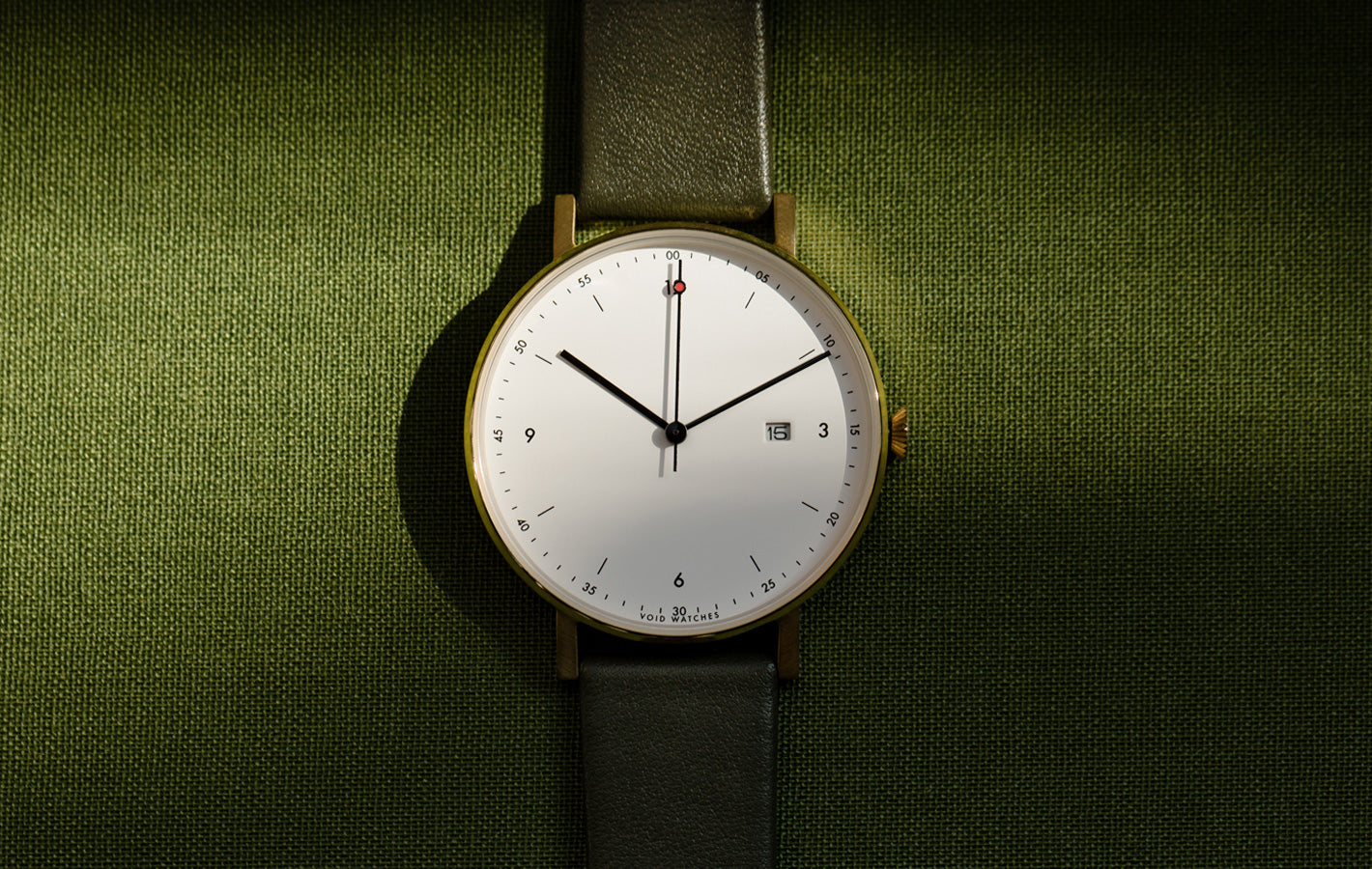 The PKG01-GO/OL/WH from VOID Watches, designed by Patrick Kim-Gustafson.
