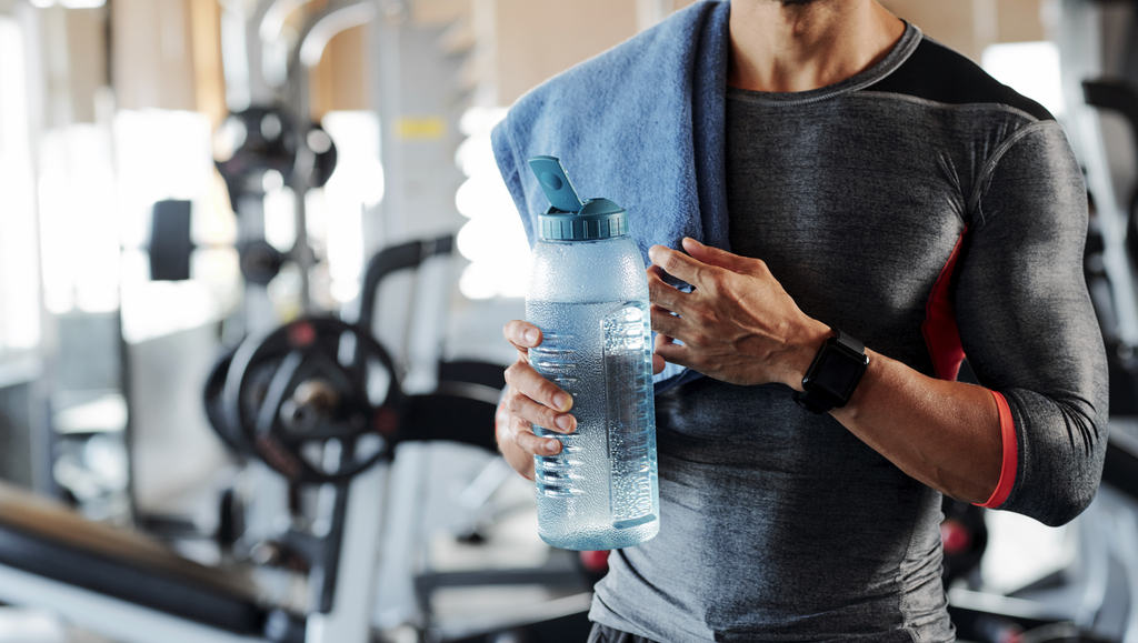 man drinking water hydration