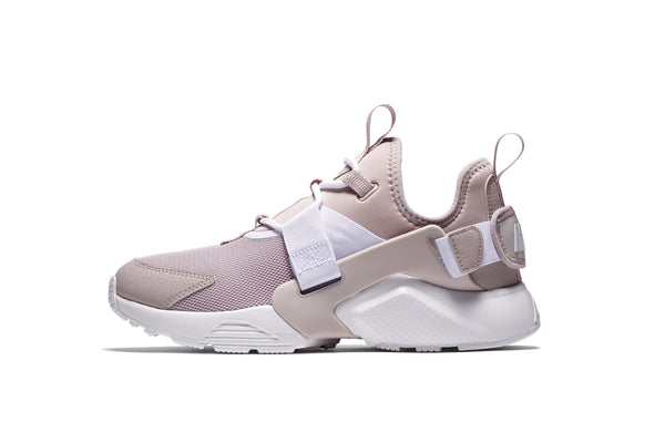 pink Nike Huarache City Low dad trainer