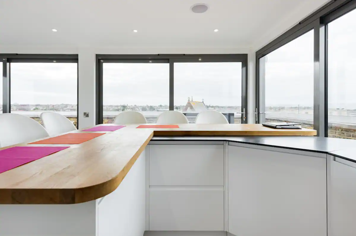 View from open plan kitchen to sea views from wrap around windows