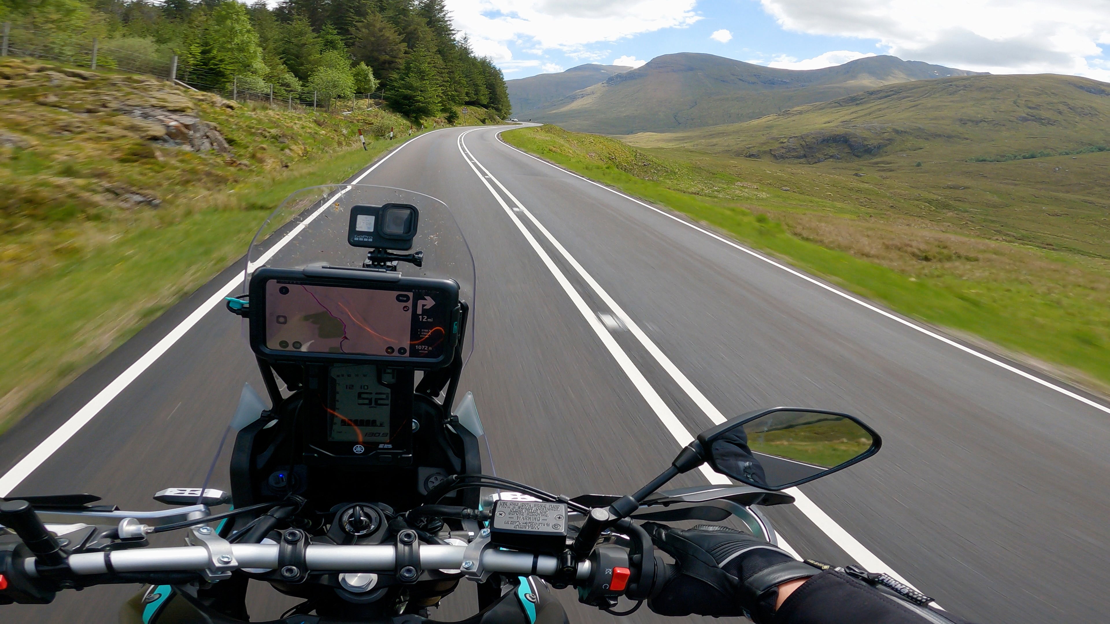 A87 Dornie sweeping bends with motorcycle and smartphone in Ultimateaddons case