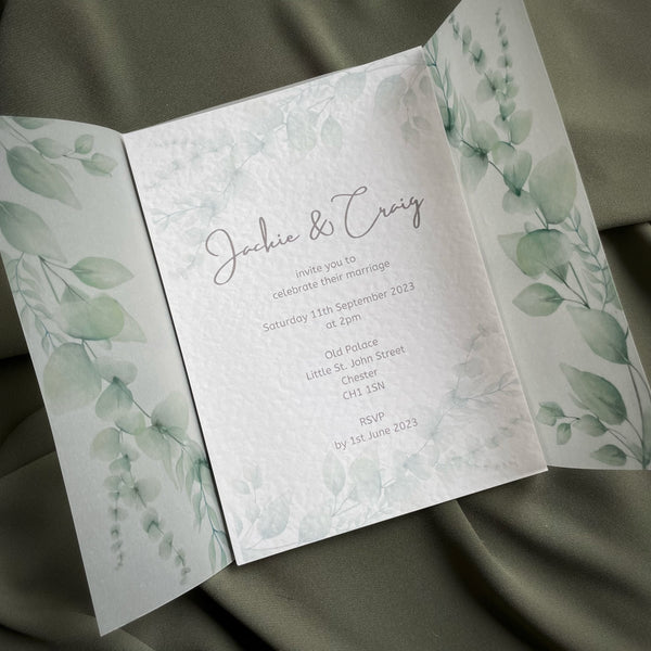 Open Vellum wrap eucalyptus wedding invitation showing the wedding day details