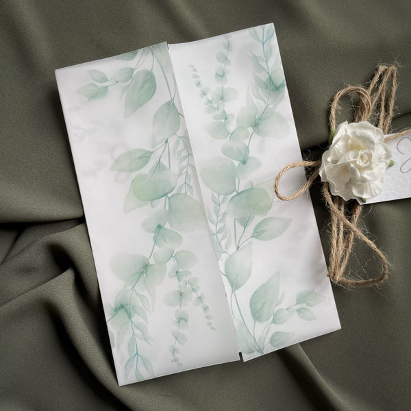 Opening the neutral green & white floral theme wedding invitations