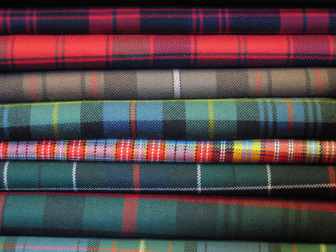 tartan fabrics stacked