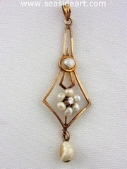 antique 9K yellow gold lavaliere filigree style pendant with one Swiss cut diamond (0.03ct) and six baroque shaped natural pearls