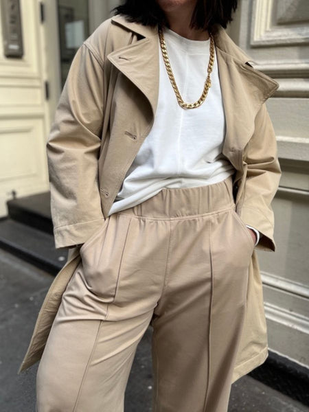 See ROSE Go models wearing out soft Multitasker Pants with Brilliant Trench, both in stone Khaki. Plus size fashion. 