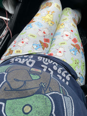 Woman wearing a tonberry t-shirt and Final Fantasy themed design leggings