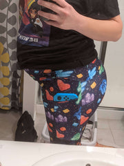 Leggings with pockets, faturing a nintendo switch in the pocket so show how big they are.