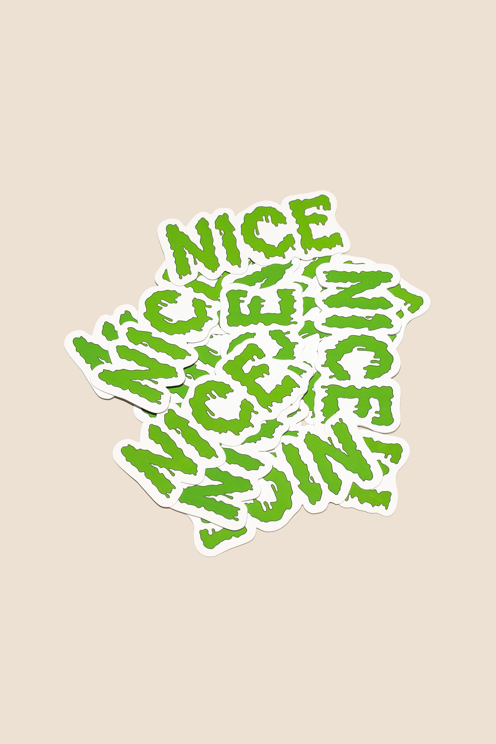 Slimey green sticker that reads Nice