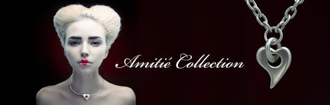 Annika Rutlin Amitie heart collection. High quality, designer, bold solid silver curved heart jewelry in solid sterling silver