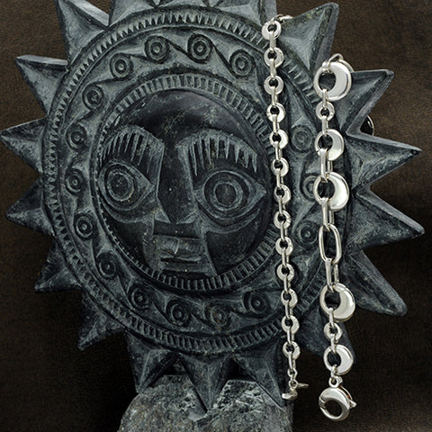 Annika Rutlin Solstice jewellery on carving from Macchu Picchu