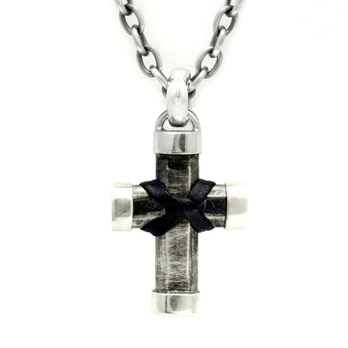 Chunky silver mixed sterling silver & leather cross by Annika Rutlin