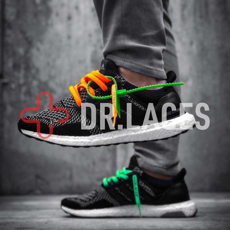 green and orange shoelaces