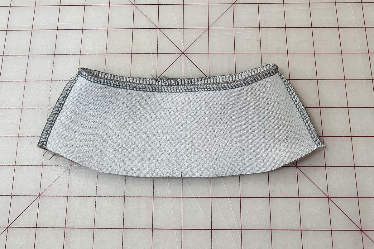 Sew around the top of the collar
