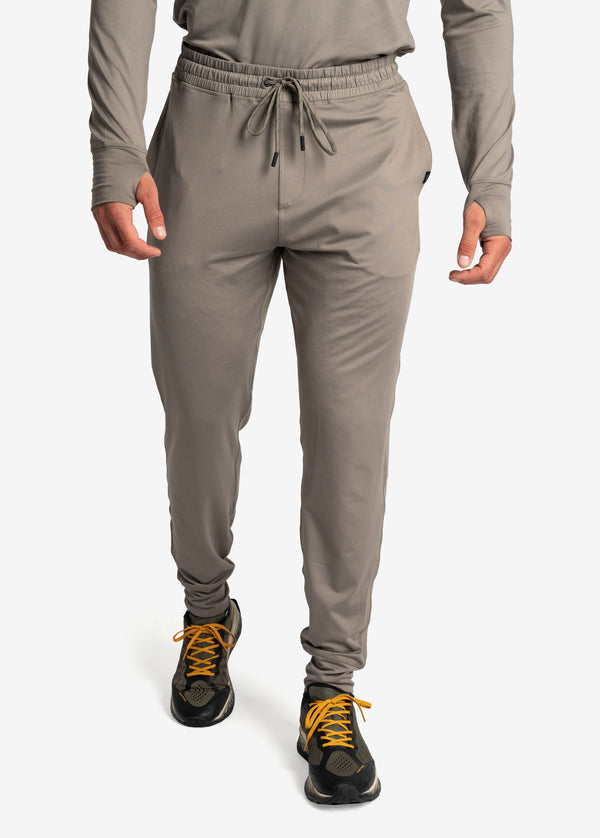 ZENWILL Ligera Jogger Gym Hombre,Pantalones Elásticos Deportivos para  Correr,Pantalon Chandal Hombre con Bolsillos Ocultos con Cremallera(Gris  Claro,S) : : Moda