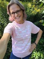 Women wearing a pink positive-message-shirts