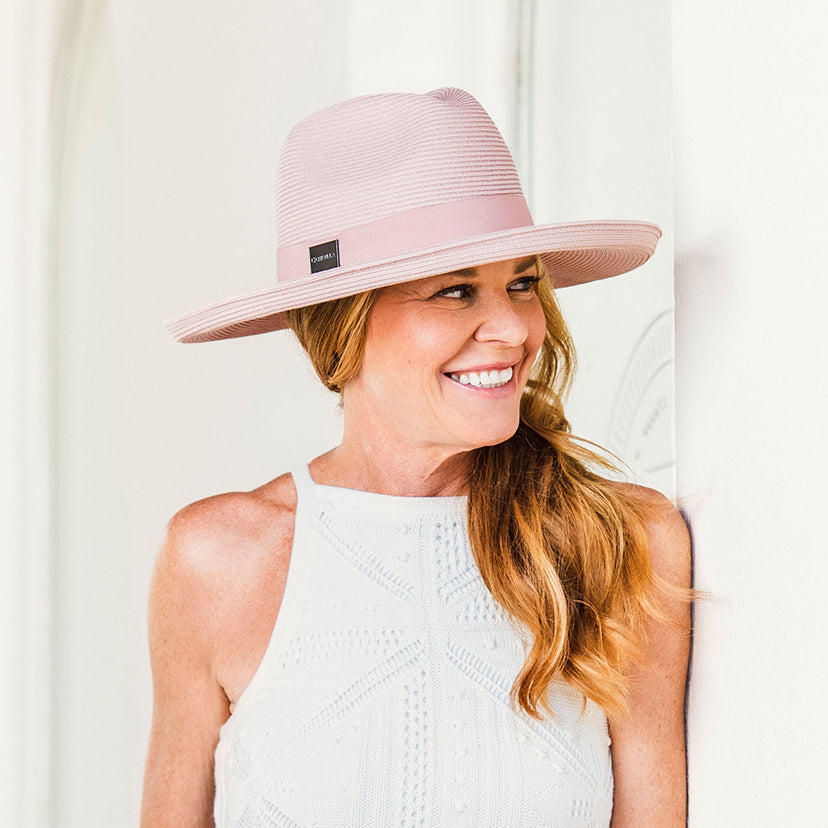 Women posing in a Carkella Vivian, a big wide brim Fedora fall/winter sun cap 