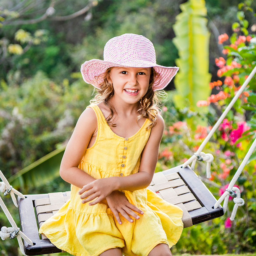 Girl on a Swing Wearing Wallaroo Kids Scrunchie Polyester Sun Hat