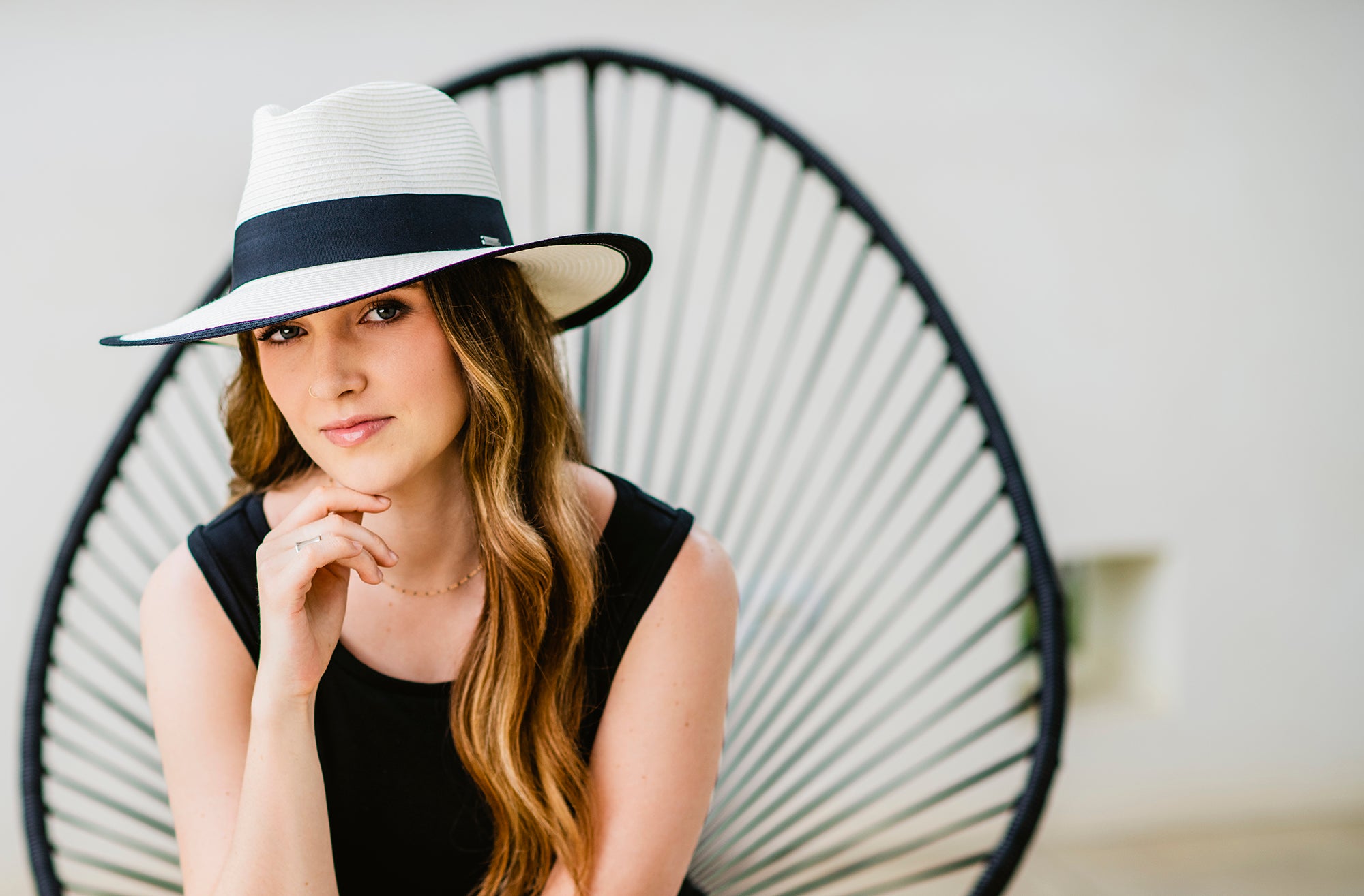 Woman outside wearing the Lauren UPF summer sun hat featuring a big wide brim