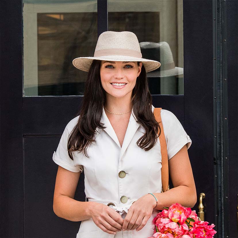 Woman Wearing the Wallaroo Petite Charlie Summer Sun Hat with uv protection