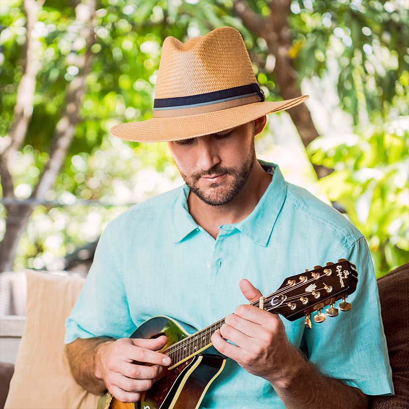 Man Wearing the Wallaroo Turner, a summer sun hat with uv protection and a big wide brim