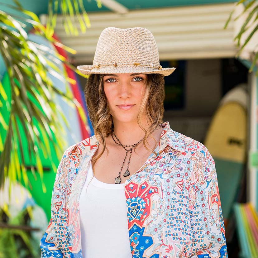 Woman Wearing a Wallaroo Waverly Beach Sun Hat for travel