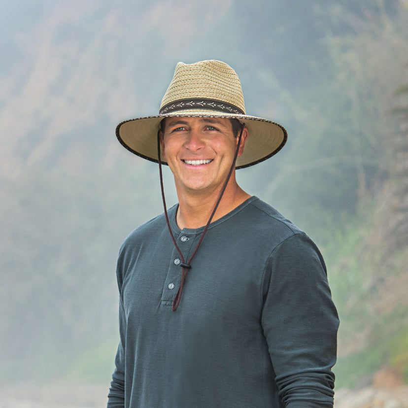 Man Smiling and Wearing a Wallaroo Cabo Beach Sun Hat with Chinstrap