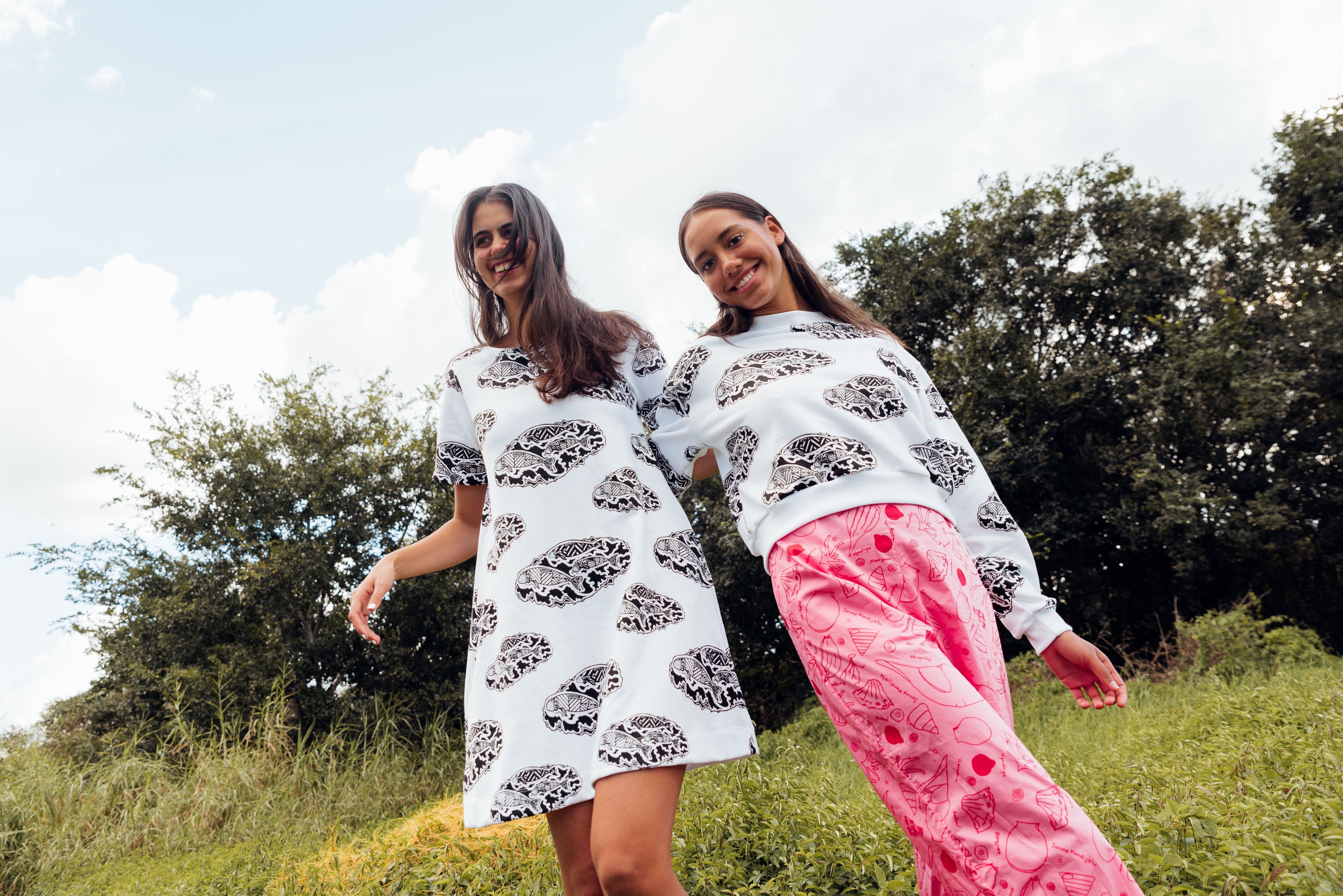 Odorr (Dugong) Family by Russel Davey worn by two models