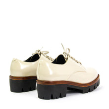 The Jeffrey Campbell Trevor chunky platform women's derby shoe is crafted in ivory box calf leather and elevated by a heavily lugged sole on a chunky heel and finished with striking polished eyelets, leather laces and contrasting tan leather welt. Buy Now Pay Later Afterpay & zipPay Available. Free & Fast Shipping AU.