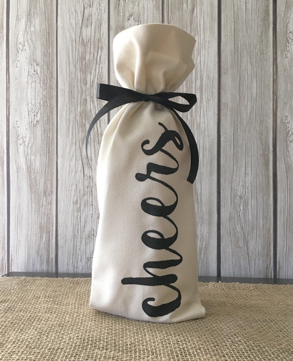 Hand painted cheers wine bag | Holiday Gift Guide 2016 | Carver Junk Company stores and online: carverjunkcompany.com | Housewarming gift | Hostess gift | wine bottle bag