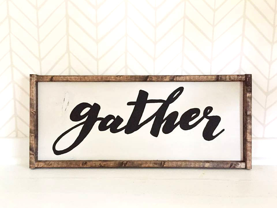 Gather sign. Handpainted wood sign. Thanksgiving Dining Room Sign. Carver Junk Company stores or online at carverjunkcompany.com. $35 Each one will vary slightly. 2016 Holiday Gift Guide 