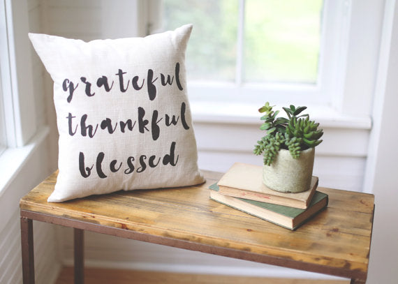 Grateful Thankful Blessed handpainted linen pillow, includes insert. Carver Junk Company stores or online at carverjunkcompany.com. $35 Each one will vary slightly. 2016 Holiday Gift Guide 