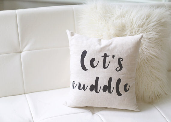 Let's Cuddle handpainted linen pillow, includes insert. Carver Junk Company stores or online at carverjunkcompany.com. $35 Each one will vary slightly. 2016 Holiday Gift Guide 