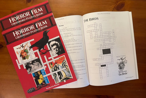 Horror Film Crossword Puzzles Book by Frederick Kinski. Cover and open book.