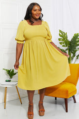 Yellow ruched flowy dress