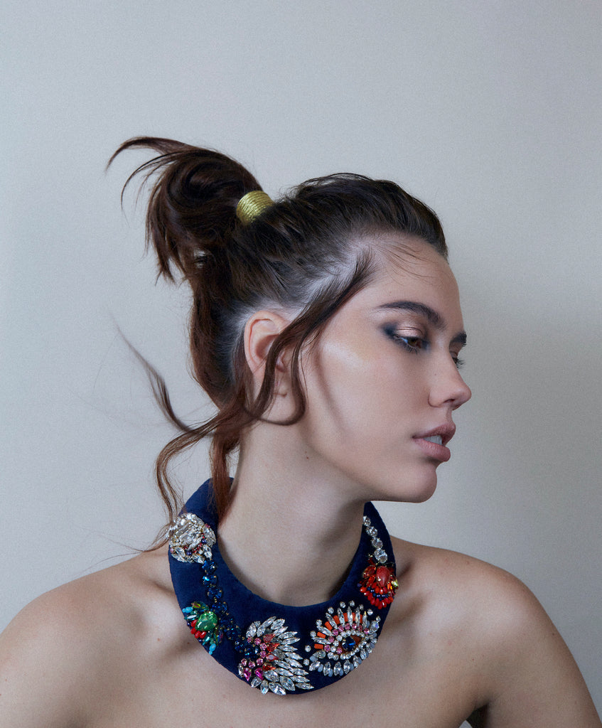 A model wearing Jolita Jewellery's statement necklace with crystal embroidery