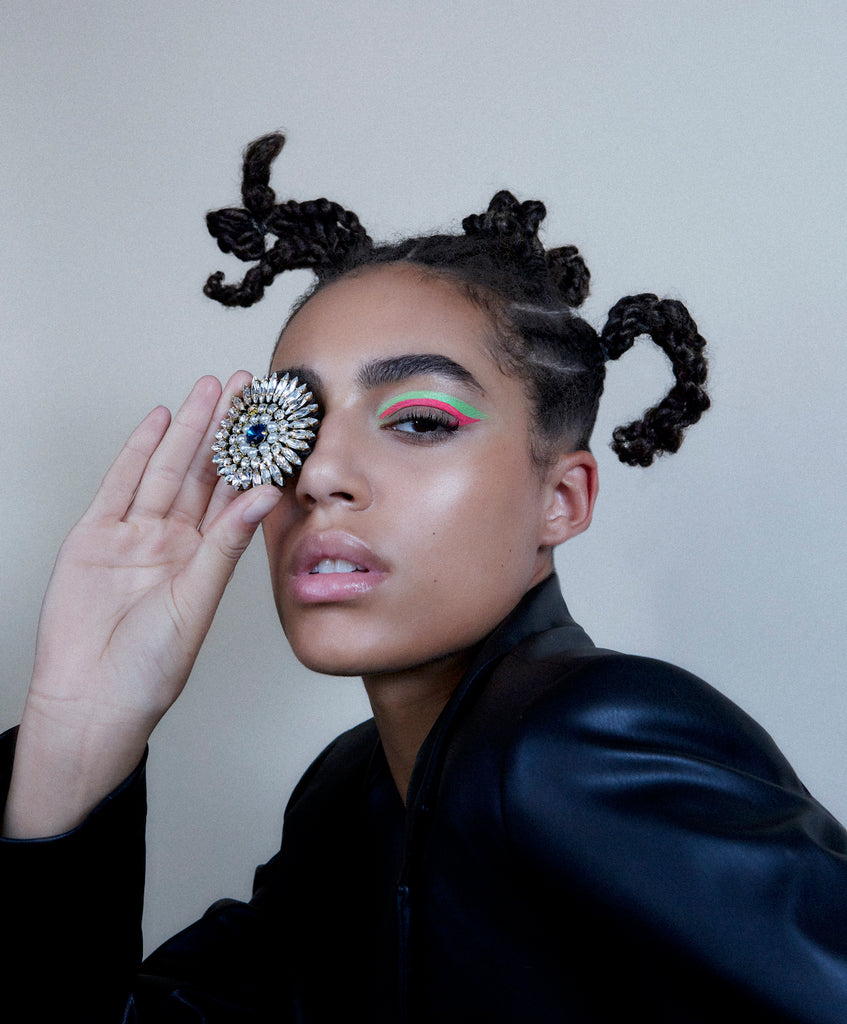 A model holding Jolita Jewellery's statement ring with glistening crystals