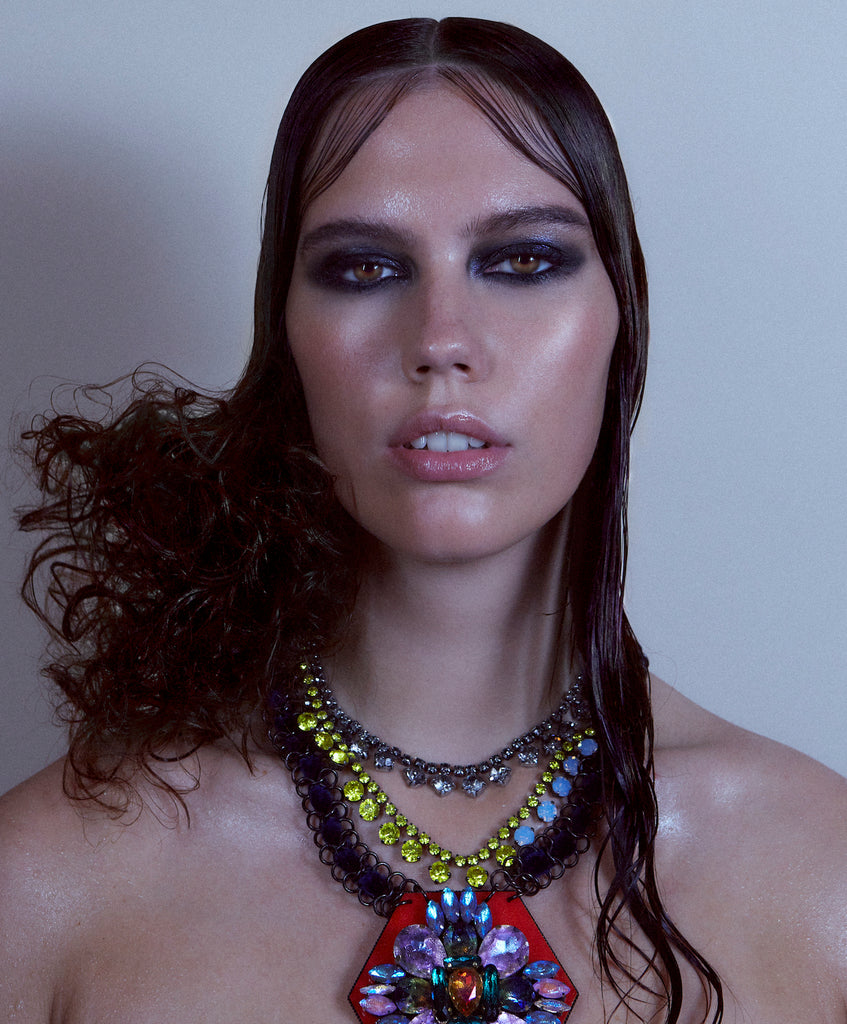 A model wearing Jolita Jewellery's statement necklace with Swarovski crystals