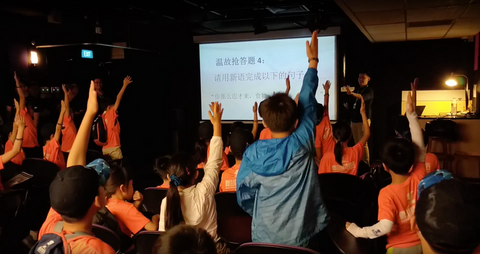 Tertiary Immersion Program Students enthusiasm raising hands