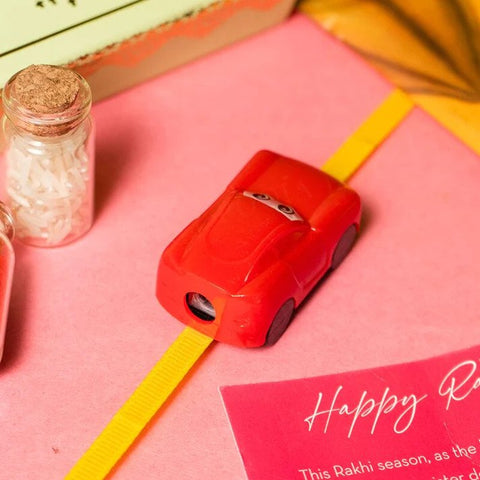 funny and quirky car shaped sharpner rakhi for your brother