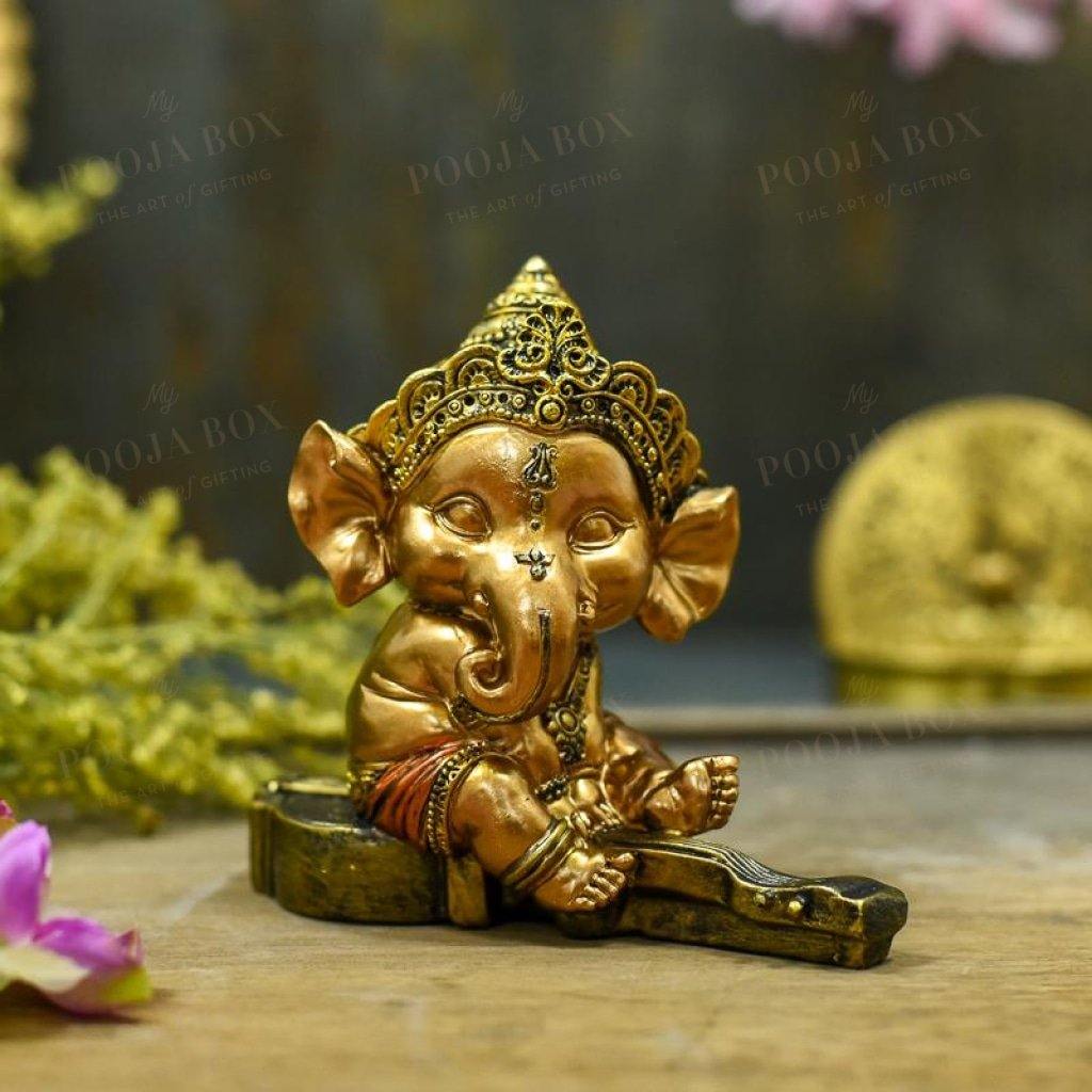 Buy Bal Ganesha On Violin Online in India - Mypoojabox.in
