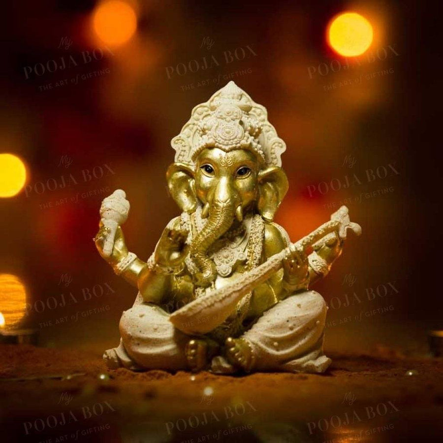 Buy Handmade Clay Ganesha Figurine with Sitar Online in India ...