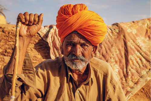 Indian man wearing ochre turban