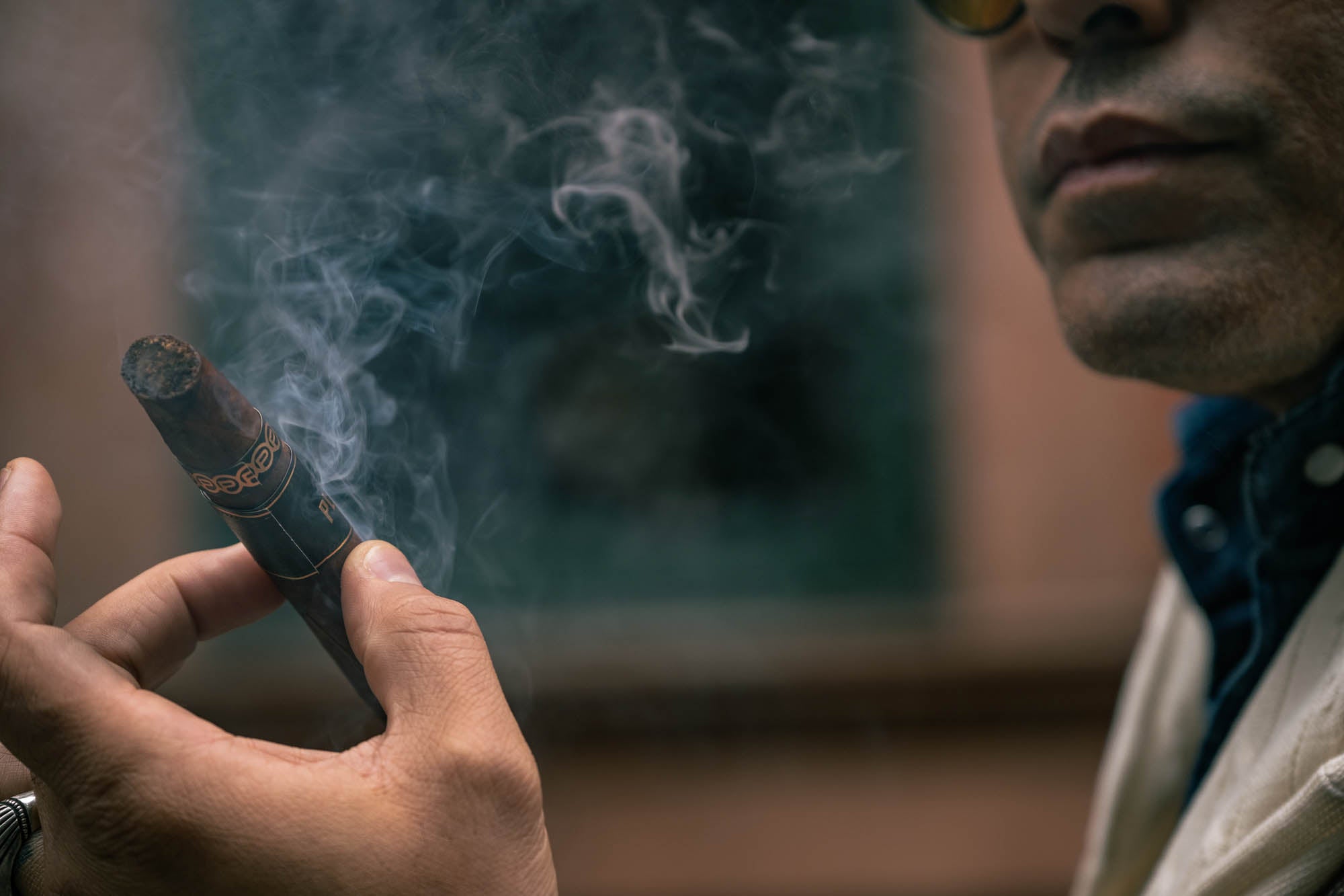 Angel Ramos smoking a Plasencia cigar in New York City