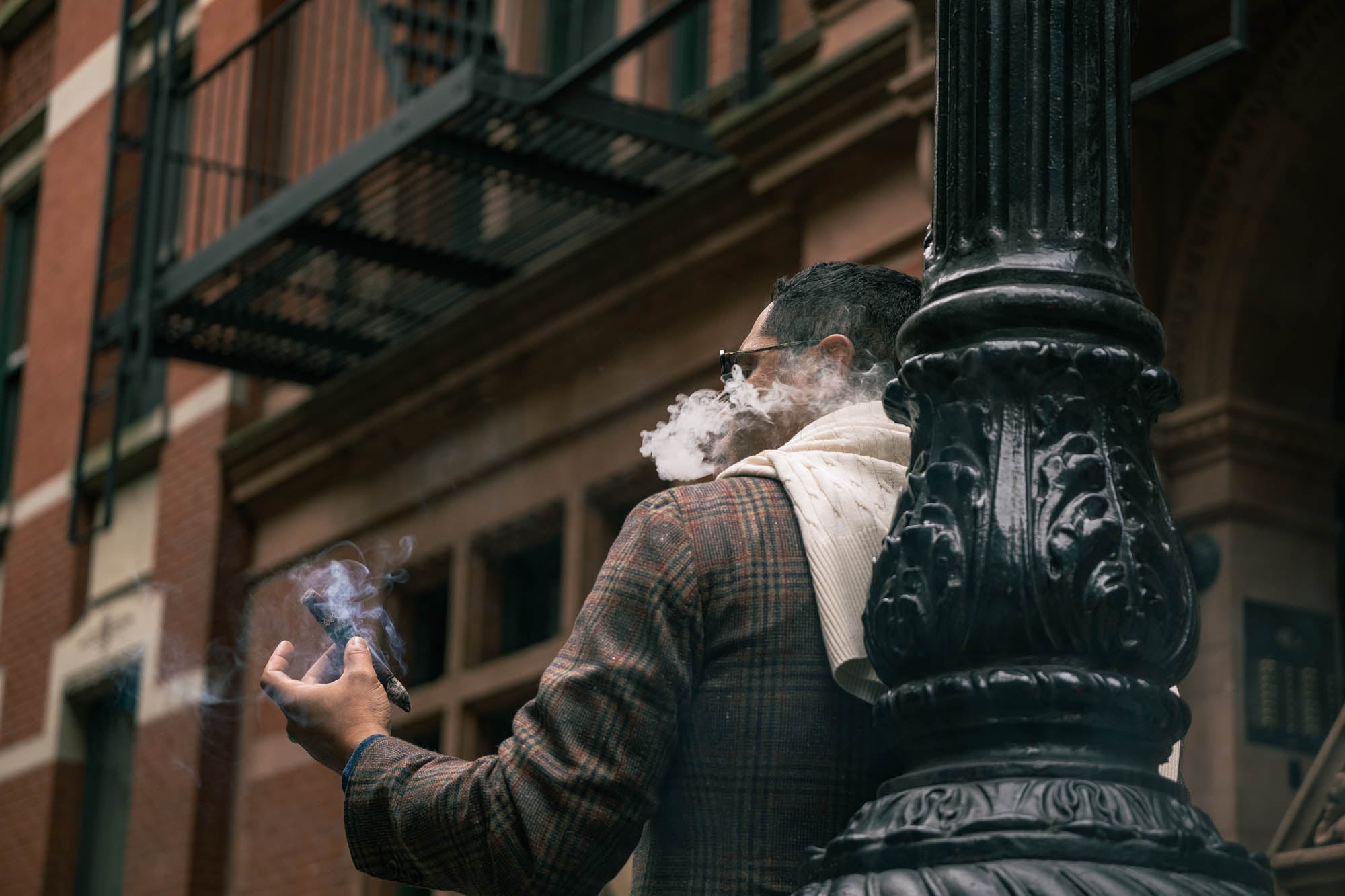 Angel Ramos smoking a Plasencia cigar in New York City