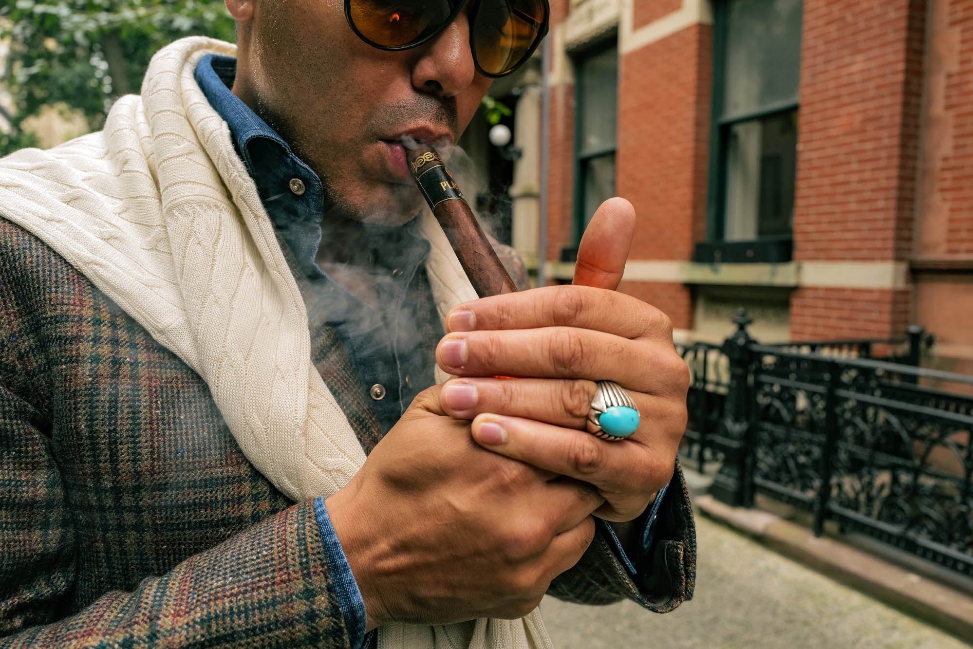 Angel Ramos smoking a Plasencia cigar in New York City