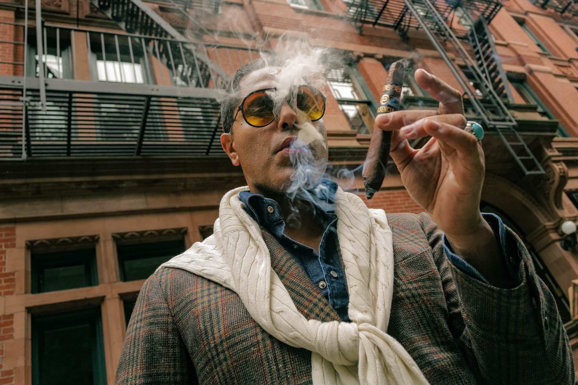 Angel Ramos smoking a Plasencia cigar in New York City