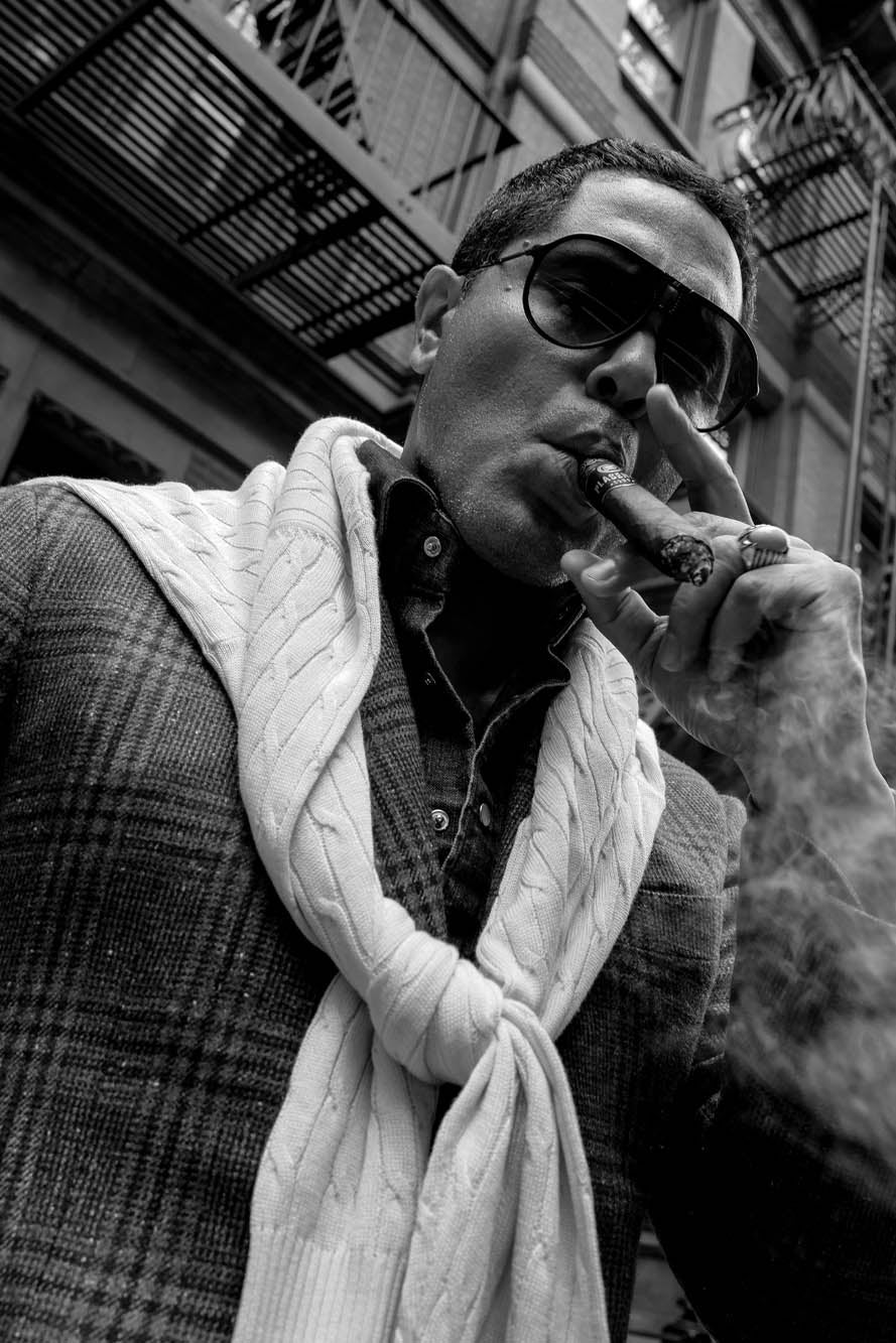 Angel Ramos smoking a Plasencia cigar in New York City